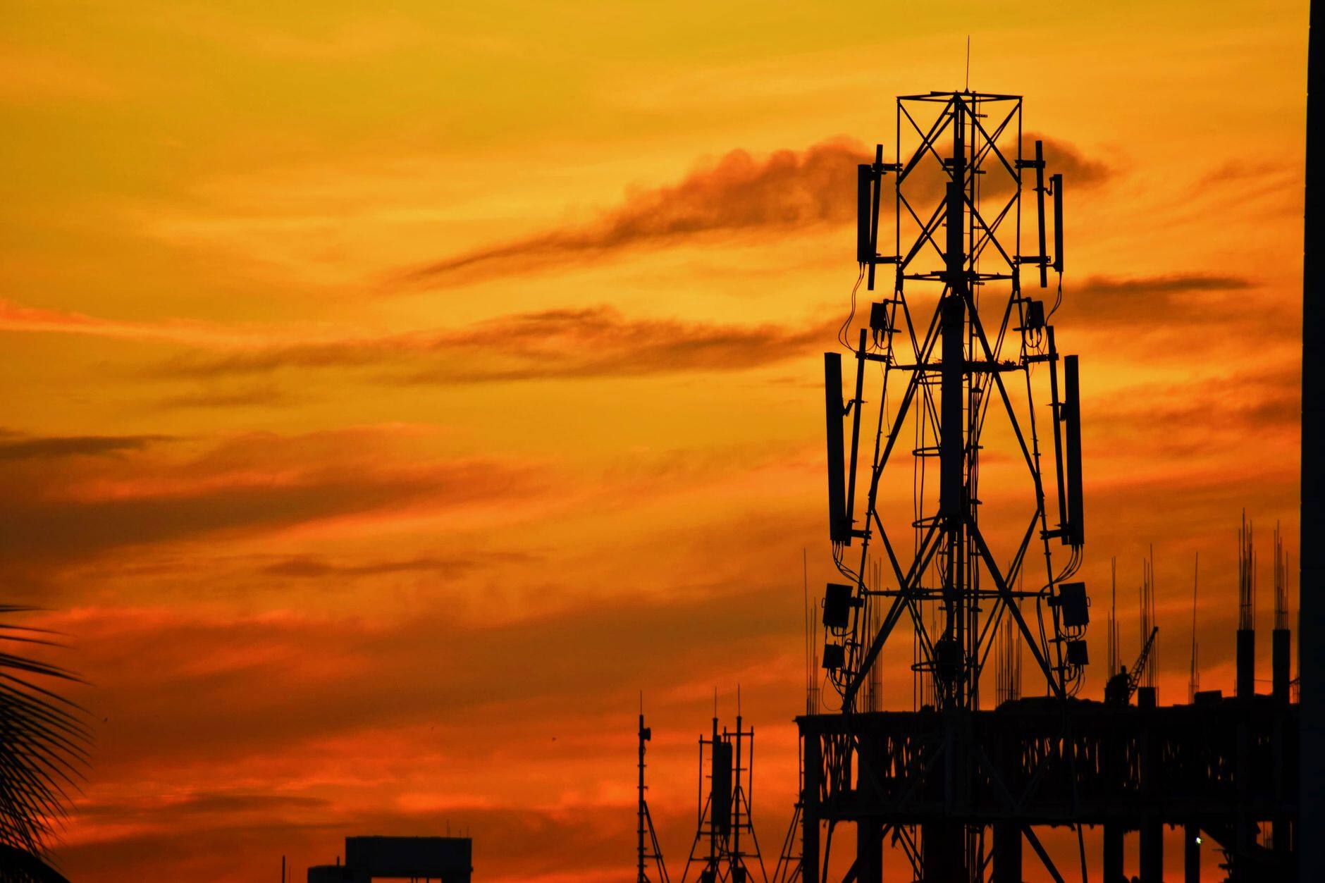 Telecommunications towers at sunset